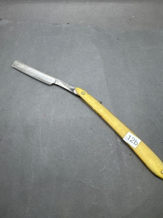 Early yellow handle cut throat razor