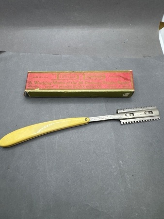Durham Emonstrator duplex yellow bone handle razor iob
