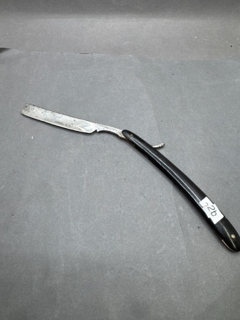 Early black handle cut throat razor
