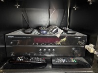 Large lot of entertainment pieces including LGTV Yamaha sound system Infinity speakers etc. - TV mounted on telescopic arms - DVDs and extra speakers included - 3