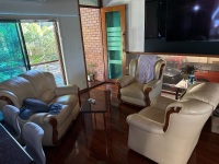 Three-piece lounge suite &ndash; possibly leather
