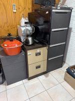 Three metal filing cabinets