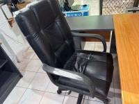 Office setting including corner unit, desk, cabinet and executive style office chair - 2