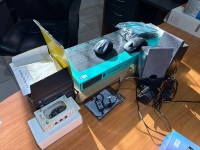Digital office equipment including Logitech keyboard and quickcam, speakers, projector etc