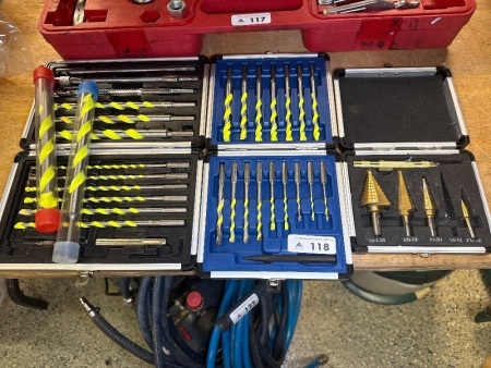 Masonry drill bits and step cone drill bits