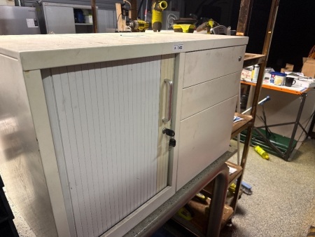 Metal storage cabinet with contents
