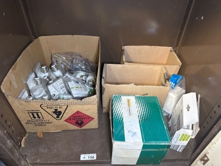 Shelf lot of mostly light globes