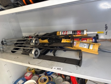 Shelf lot of Ramsey and silicone guns