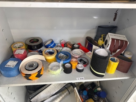 Shelf a lot of various tapes and abrasive papers