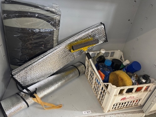 Shelf lot of car cleaning products and accessories