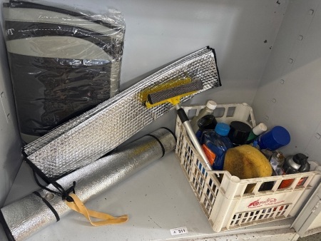 Shelf lot of car cleaning products and accessories