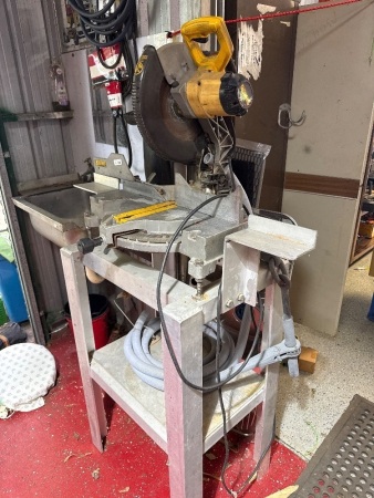 DeWalt adjustable drop saw on aluminium stand