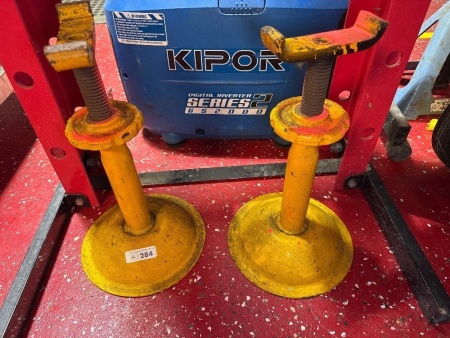 Two vehicle stands
