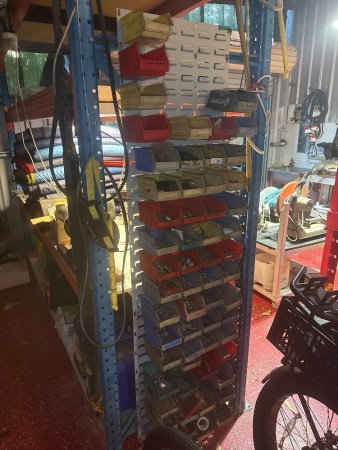 Wall mounted shelving kit with contents