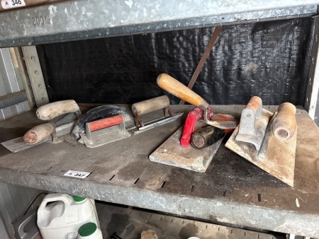 Shelf a lot of concrete trowels