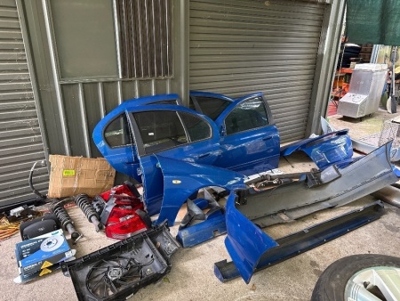 Bulk lot of Ford falcon possibly BA panels, parts, and accessories