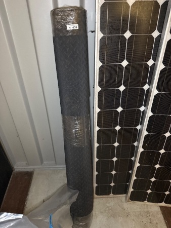 Roll of a chequered grip rubber matting