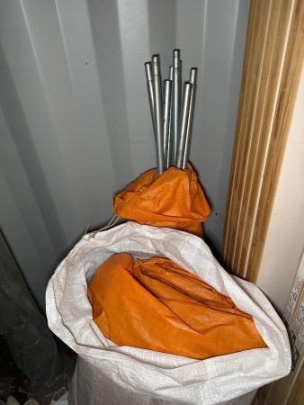 Tarp with frame for portable shelter ?