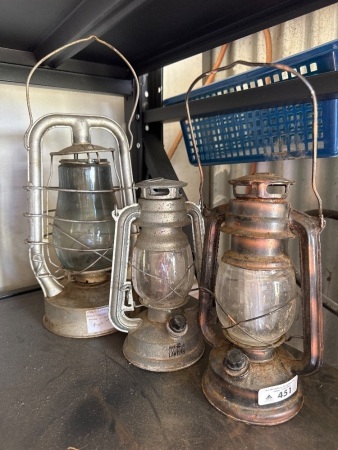 Three hurricane lanterns