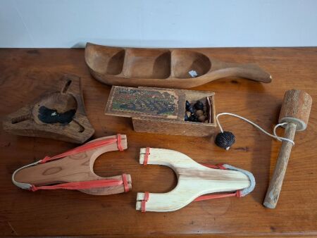 Box lot of assorted items - inc. sling shots, chessman set, vintage game, etc