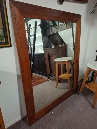 Large wood framed wall hanging mirror