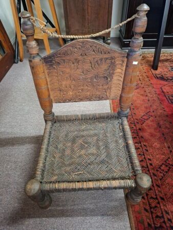 Antique carved tribal swat chair