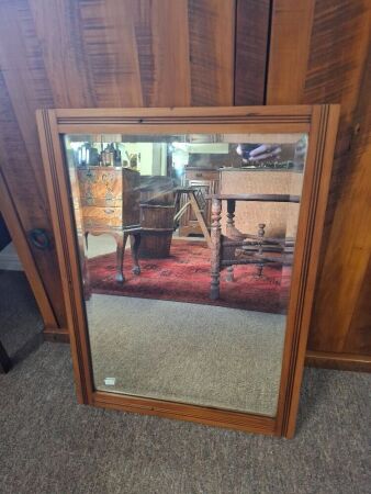 Wood framed wall hanging mirror