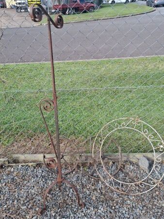 Mixed metal garden decorator items - wheels, hanger, scrolled stand