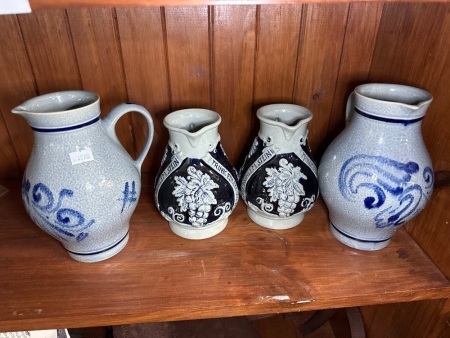 4x German glazed stoneware wine pitchers - 1 repaired