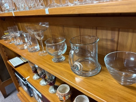Shelf lot of assorted glasses etc