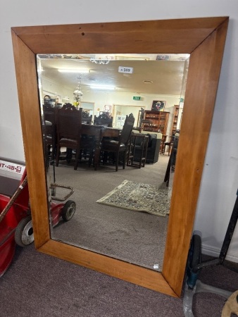 Large wood framed wall hanging mirror
