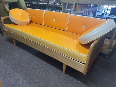 Timber and rattan 3-seater sofa with vibrant colour vinyl cushions