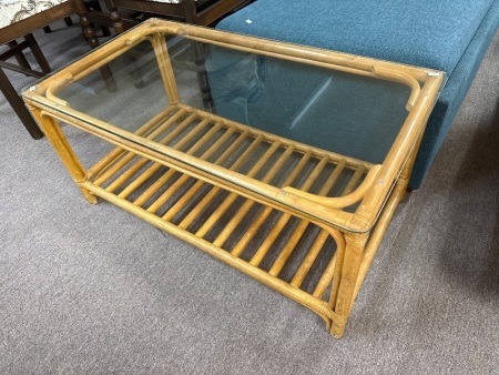 Cane coffee table with glass top