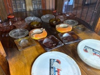 Shelf lot of assorted ashtrays
