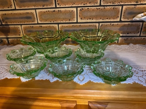 Set of green glass depression bowls