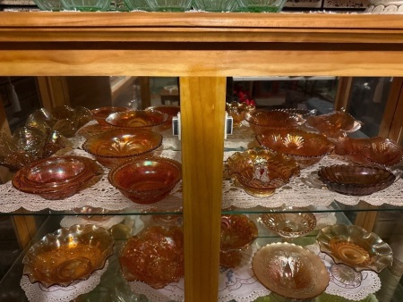 Shelf lot of mostly Marigold carnival glass bowls
