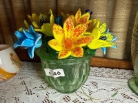 Green depression glass vase and frog with coloured glass flowers