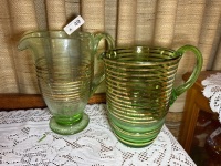 2x green glass pitchers with gold trim - one is glow/uranium - 2