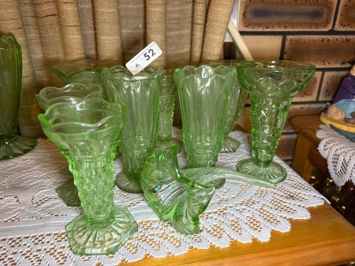 Assorted green depression, glass vases and flower