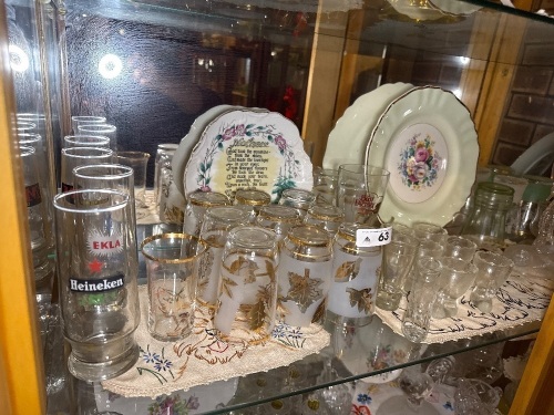 Shelf lot of various glassware and plates