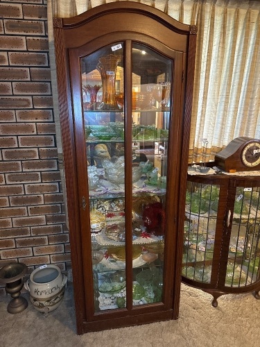Wooden display cabinet with glass shelving