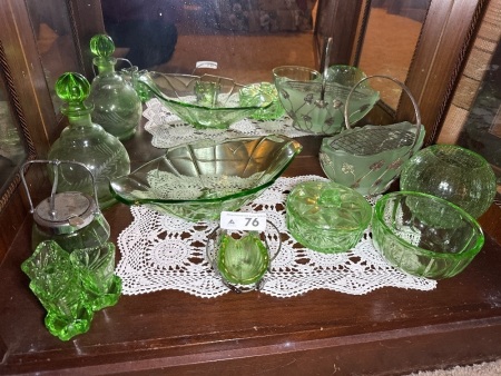Shelf lot of assorted green glassware