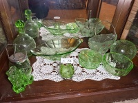 Shelf lot of assorted green glassware
