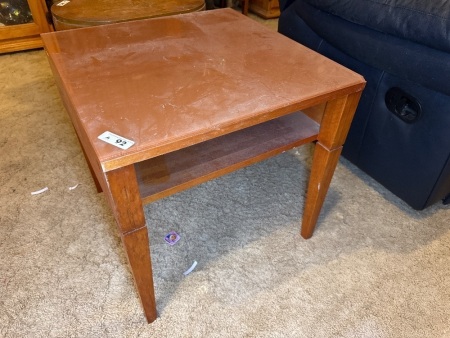 Wooden side table with storage compartment
