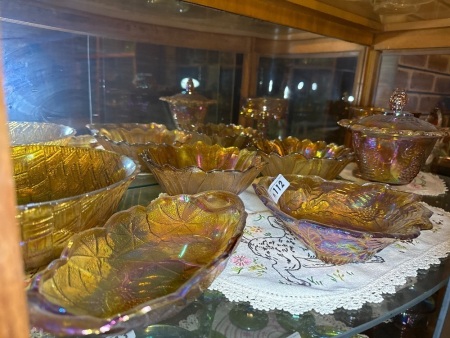 Shelf lot of Amber Carnival glass