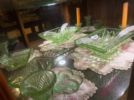 Shelf lot of green depression glass pieces