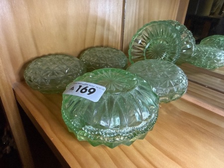 Assortment of green depression glass dishes