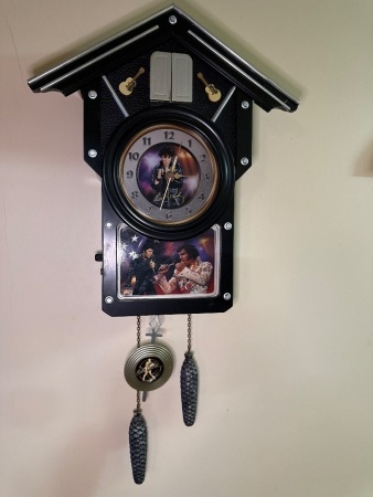 Elvis replica pendulum clock