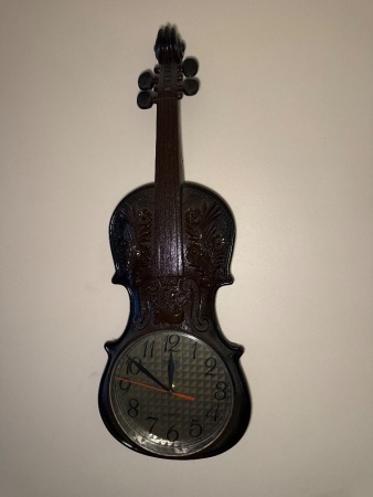Plastic violin battery powered clock