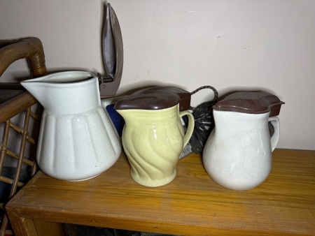 Three vintage porcelain kettles with spare elements and chords